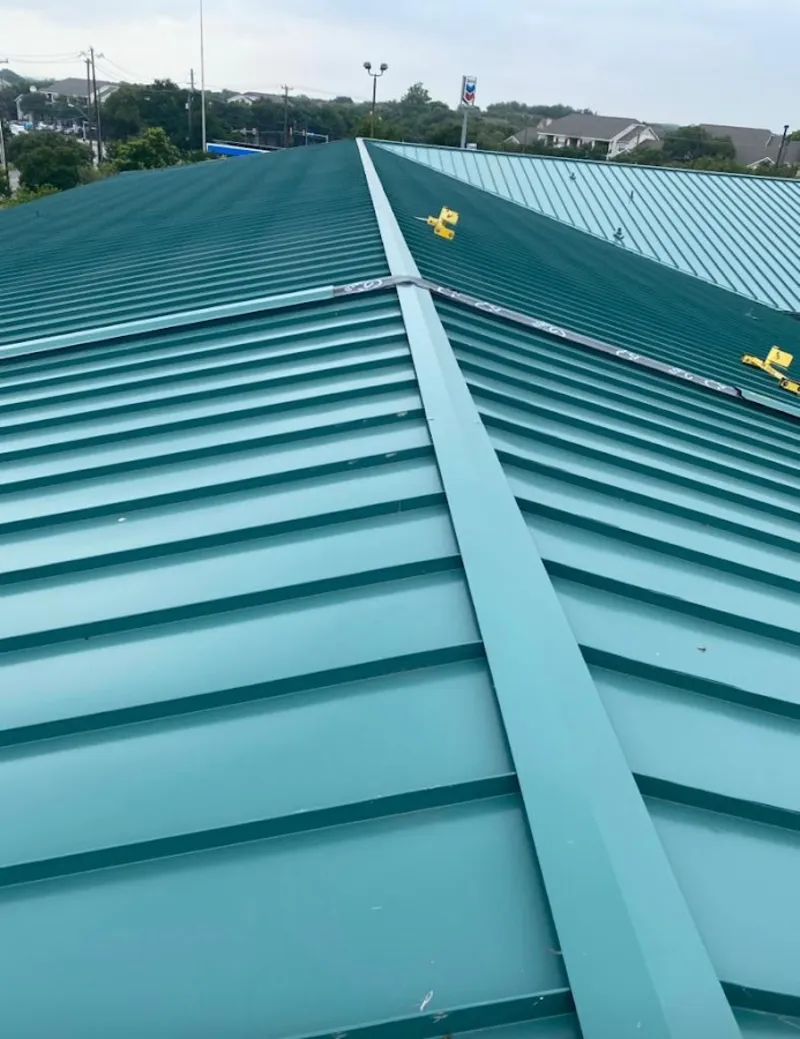 Green commercial metal roof ridge and valley for Metal Roof Repair in Claremore